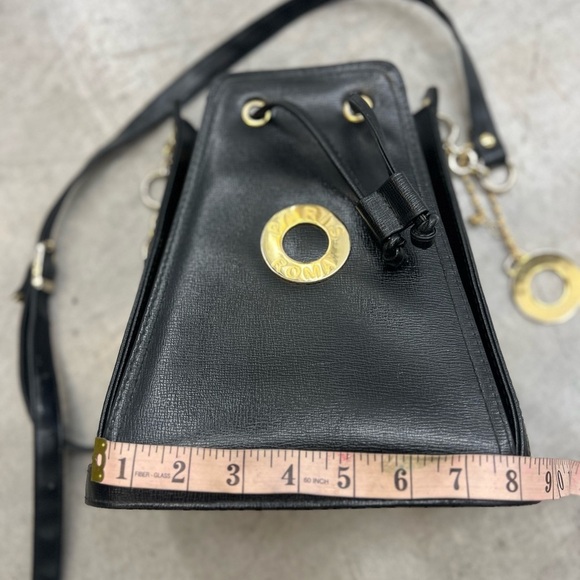 Small Black Crossbody Bag with Gold Accents and Drawstring Closure - Picture 5 of 13